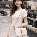 Long Chain Box Bag for Girls:   - Features a long chain for effortless wear   - Showcases a front YSL emblem for an elegant appearance   - Designed in a convenient side crossbody style